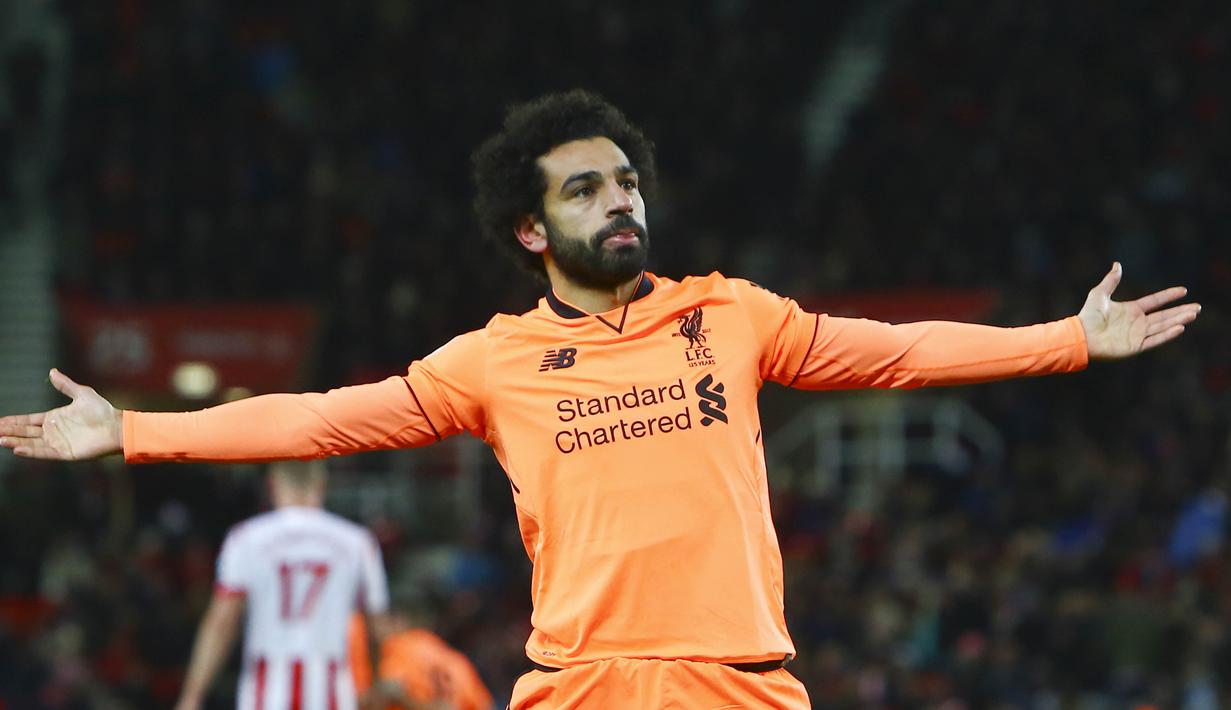 1. Mohamed Salah (Liverpool) - 12 Gol. (AFP/Geoff Caddick)