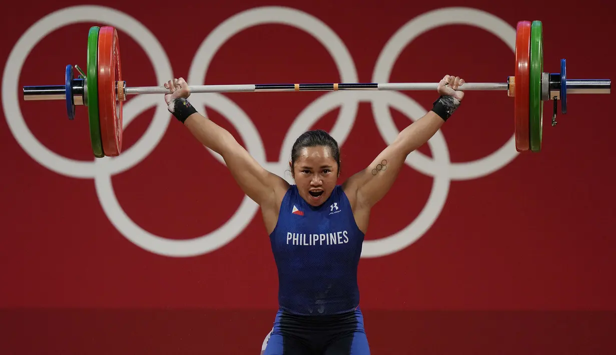 Bagi Hidilyn Diaz, atlet angkat besi putri Filipina berusia 30 tahun, Olimpiade Tokyo 2020 ini adalah Olimpiade keempat sepanjang kariernya. (Foto: AP/Luca Bruno)