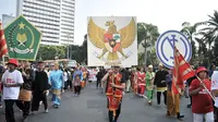 Sambut Pemilu 2019, Umat Berbagai Agama Gerak Jalan Bersama. (Merdeka.com/Ronald)