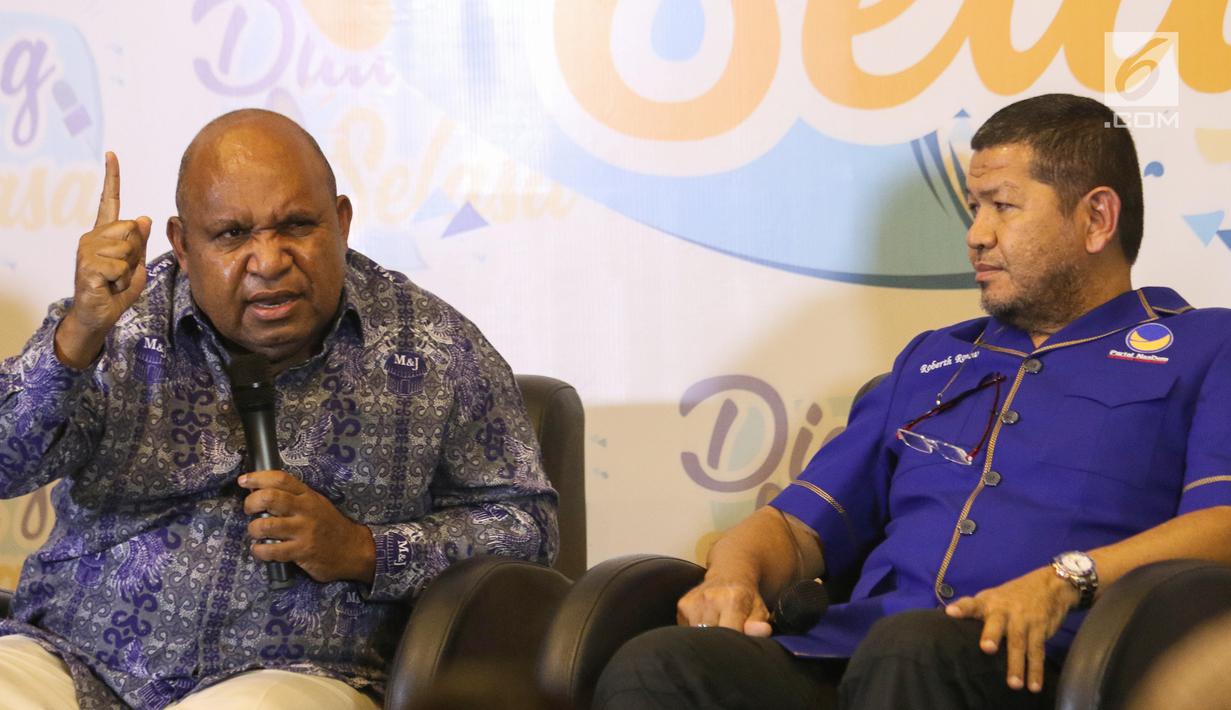 Bupati Lanny Jaya Befa Yigibalom dan Anggota DPR RI terpilih Fraksi Partai Nasdem Roberth Rouw menjadi pembicara dalam dialog Selasa di Jakarta Selasa (10/9/2019). Dialog mengusung Papua Bicara Papua: Dari Papua untuk NKRI mencari solusi masalah papua untuk keutuhan NKRI. (Liputan6.com/Angga Yuniar)