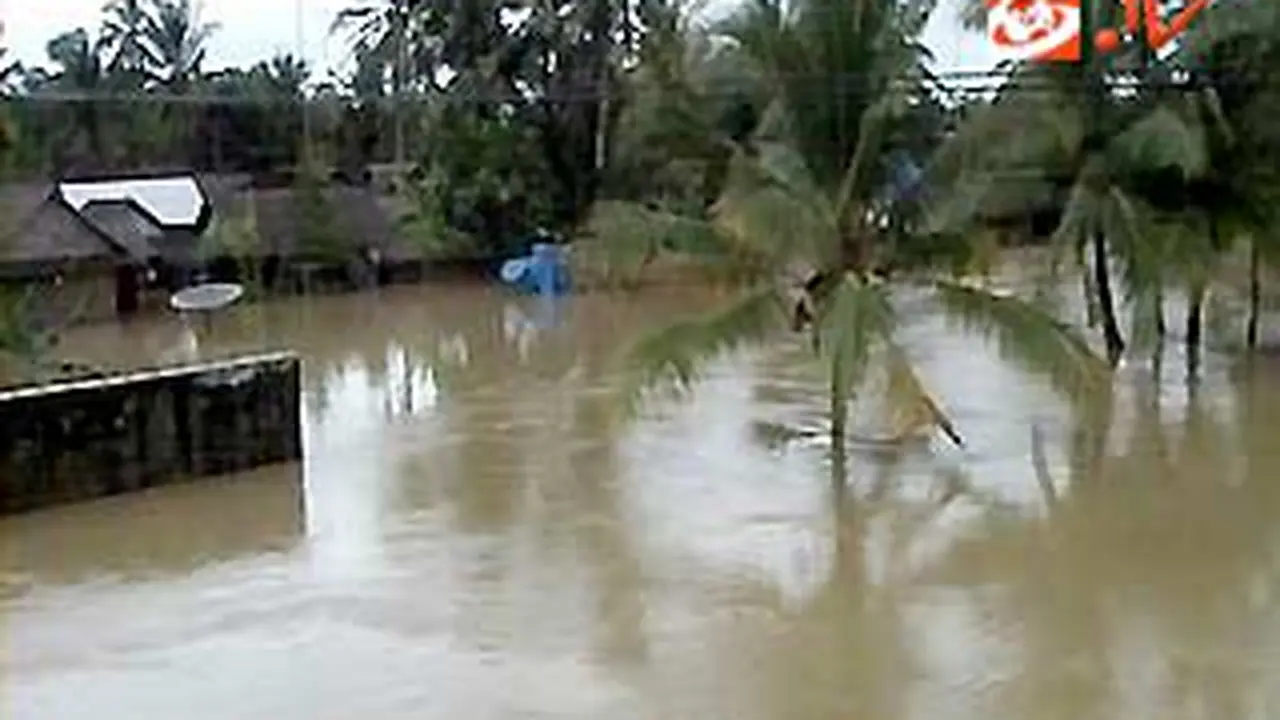 110328terk1_banjir-pandglng.jpg