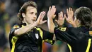 Catalunya's Joan Verdu (L) is congratuled by his teamate Bojan Krkic (R) after scoring against National Colombian team during a friendly football match on December 28, 2008 at Camp Nou stadium in Barcelona. AFP PHOTO/ JOSEP LAGO 
