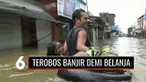 Miris, belum surut dan bantuan yang tak kunjung datang, sejumlah warga di Katingan, Kalimantan Tengah nekat terobos banjir dengan berjalan kaki demi membeli sembako.