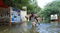 Sungai Shabelle yang meluap membuat Banjir terjadi di tepian Beledweyne, di Somalia tengah. (AFP/Hasan Ali Elmi)
