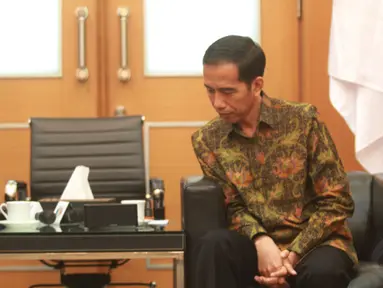 Jokowi'blusukan' ke masyarakat adat di Papua melalui audio conference, Jakarta, (24/9/14). (Liputan6.com/Herman Zakharia)