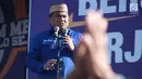 Mantan Menteri Perdagangan Rachmat Gobel memberikan sambutan saat menghadiri Kampanye Rapat Umum di Gorontalo, Minggu (24/3). Partai Nasdem mengawali Kampanye Terbuka di Provinsi Gorontalo. (Liputan6.com/Arfandi Ibrahim)