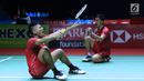 Ganda putra Indonesia, Fajar Alfian/M Rian Ardianto merayakan kemenangan usai melawan Liu Cheng/Zhang Nan (China) pada 8 besar Indonesia Open 2018, Istora GBK, Jakarta, Jumat (5/7). Fajar/Rian unggul 21-18, 18-21, 25-23. (Liputan6.com/Helmi Fithriansyah)