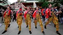 Sejumlah wanita mengenakan pakaian tradisional saat merayakan Festival Kanda Matsuri di Tokyo, Minggu (14/5). Festival Kanda dilaksanakan setiap hari Sabtu dan Minggu pada tanggal-tanggal terdekat dengan 15 Mei. (AP Photo / Shizuo Kambayashi)