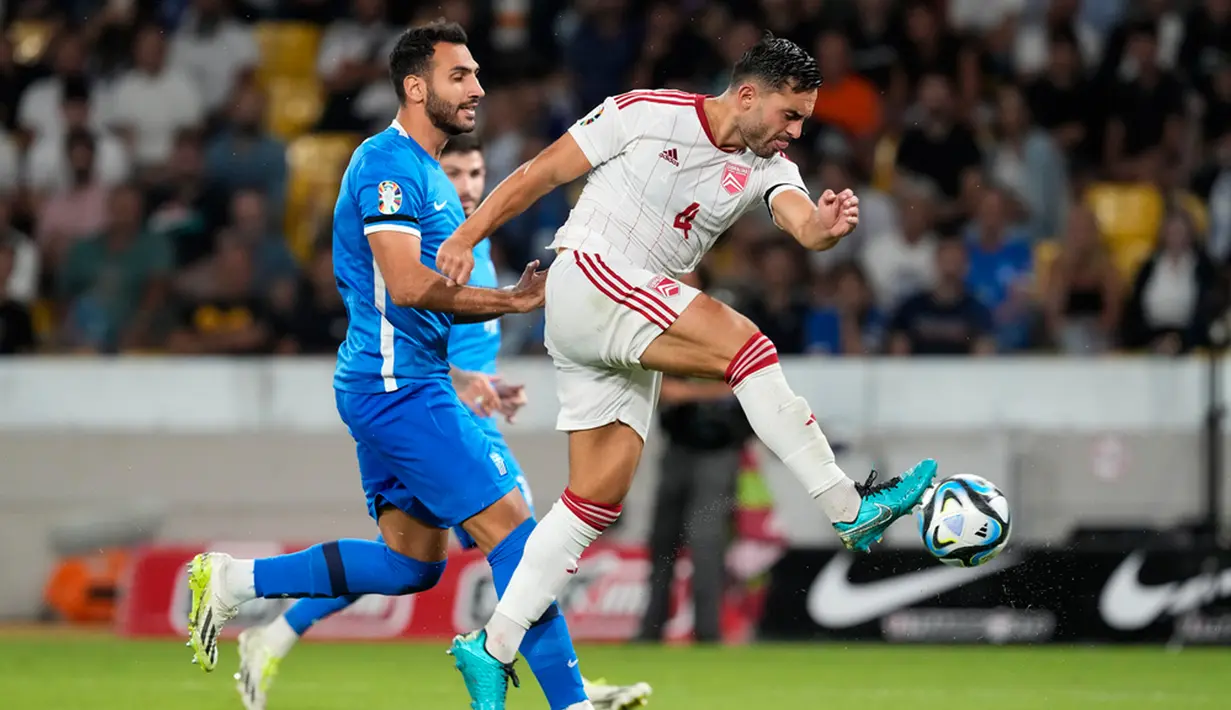 Konstantinos Mavropanos dan Georgios Masouras sama-sama mencetak brace, satu gol lagi dilesakkan Dimitrios Pelkas. (AP Photo/Yorgos Karahalis)