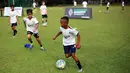 <p>Sejumlah anak-anak sedang bermain sepak bola setelah Launching Borussia Academy di Deutsche Schule Jakarta, BSD, Tangerang, Sabtu (03/06/2023). (Bola.com/Bagaskara Lazuardi)</p>