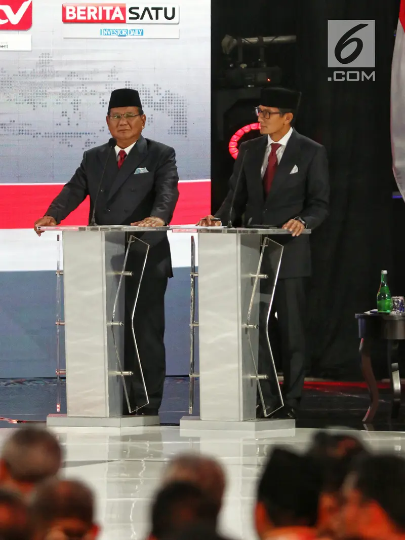 Ekspresi Prabowo - Sandiaga Uno Saat Debat Kelima Pilpres 2019