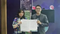 Direktur ATVI Melitina Tecoalu dan Ketua TDA Jakarta Barat Syafli Antia menandatangani nota kesepahaman (MoU) di Studio 3 Indosiar Jakarta, Jumat (22/09/2023). Dok: ATVI