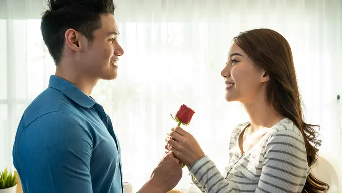 perempuan dan pasangan 5 september bunga