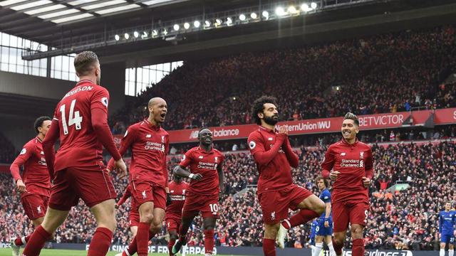 Penyerang Liverpool, Mohamed Salah, merayakan golnya ke gawang Chelsea dalam laga Liga Inggris di Stadion Anfield