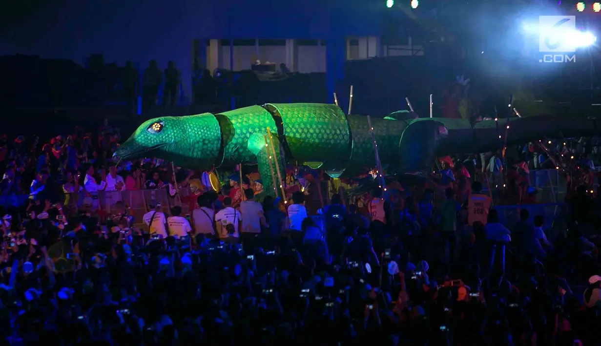 Pertunjukkan seni pada Penutupan Asian Para Games 2018 di Stadion Madya, Gelora Bung Karno, Jakarta, Sabtu (13/10). Upacara penutupan bertajuk "We Are One Wonder” dihadiri oleh Wakil Presiden RI Jusuf Kalla. (merdeka.com/Imam Buhori)