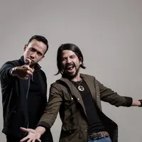 Maruli Tampubolon dan Ariyo Wahab, pemain film Merah Putih Memanggil. (Daniel Kampua/Bintang.com)