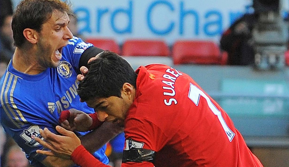  Luis Suarez  adalah pemain hebat tetapi dia termasuk dalam golongan pemain yang tidak disiplin. Selain jago mencetak gol, Luis Suarez juga sering bermasalah. (AFP)