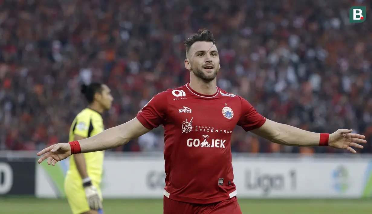 Striker Persija, Marko Simic, merayakan gol yang dicetaknya ke gawang Persela pada laga Liga 1 di SUGBK, Jakarta, Selasa (20/11). Persija menang 3-0 atas Persela. (Bola.com/Yoppy Renato)