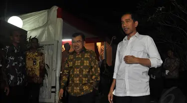 Jokowi dan Jusuf Kalla menghadiri acara pembubaran Kelompok Kerja Tim Transisi di Rumah Transisi, Jakarta, (28/9/14). (Liputan6.com/Miftahul Hayat)