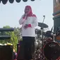 Mensos Khofifah pada acara Hari Anak Nasional 2015 di Surabaya (Liputan6.com/Dian Kurniawan)