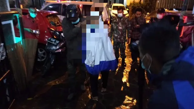 Ny U mendapat perawatan maksimal dari tenaga medis di RS Rotinsulu. Sehingga, akhirnya, ia bisa melewati masa perawatan dengan baik dan akhirnya dinyatakan sembuh dari virus Corona Covid-19, di Purwakarta. (Foto: Liputan6.com/Abramena)