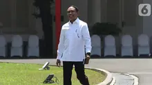 Politikus Partai Golkar Zainudin Amali tersenyum saat tiba di Istana, Jakarta, Selasa (22/10/2019). Belum diketahui posisi apa yang akan diisi oleh Zainudin dalam kementerian Kabinet Kerja Jilid II. (Liputan6.com/Angga Yuniar)