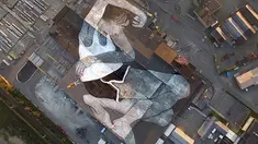 Jaime Rojo dan Steven Harrington dari Brooklyn Street Art menyebut bahwa 'raksasa tidur' itu mungkin merupakan mural figuratif terbesar di dunia.