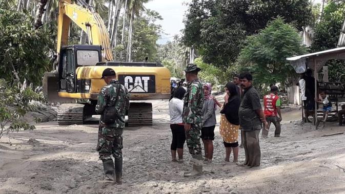 Banjir bandang akibat hujan dengan intensitas tinggi di wilayah Desa Poi Kecamatan Dolo Selatan Kabupaten Sigi pada Minggu, 8 Desember 2019. (Dok Badan Nasional Penanggulangan Bencana/BNPB)