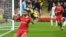 Pada menit ke-76, tandukan Cody Gakpo berhasil menggetarkan jala gawang Real Madrid yang dikawal Thibaut Courtois. Liverpool unggul 2-0 atas Real Madrid. (Oli SCARFF/AFP)