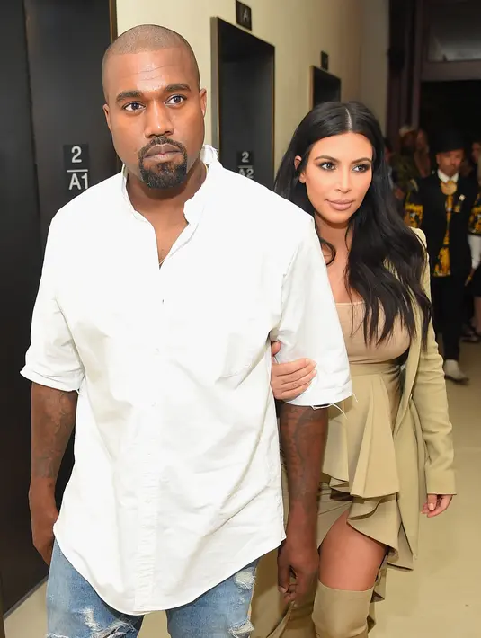 Di acara pesta tersebut, TMZ melaporkan, Calvin Harris datang dan memihak Kim Kardashian seolah dirinya memberi peringatan keras untuk Taylor Swift. (AFP/Bintang.com)