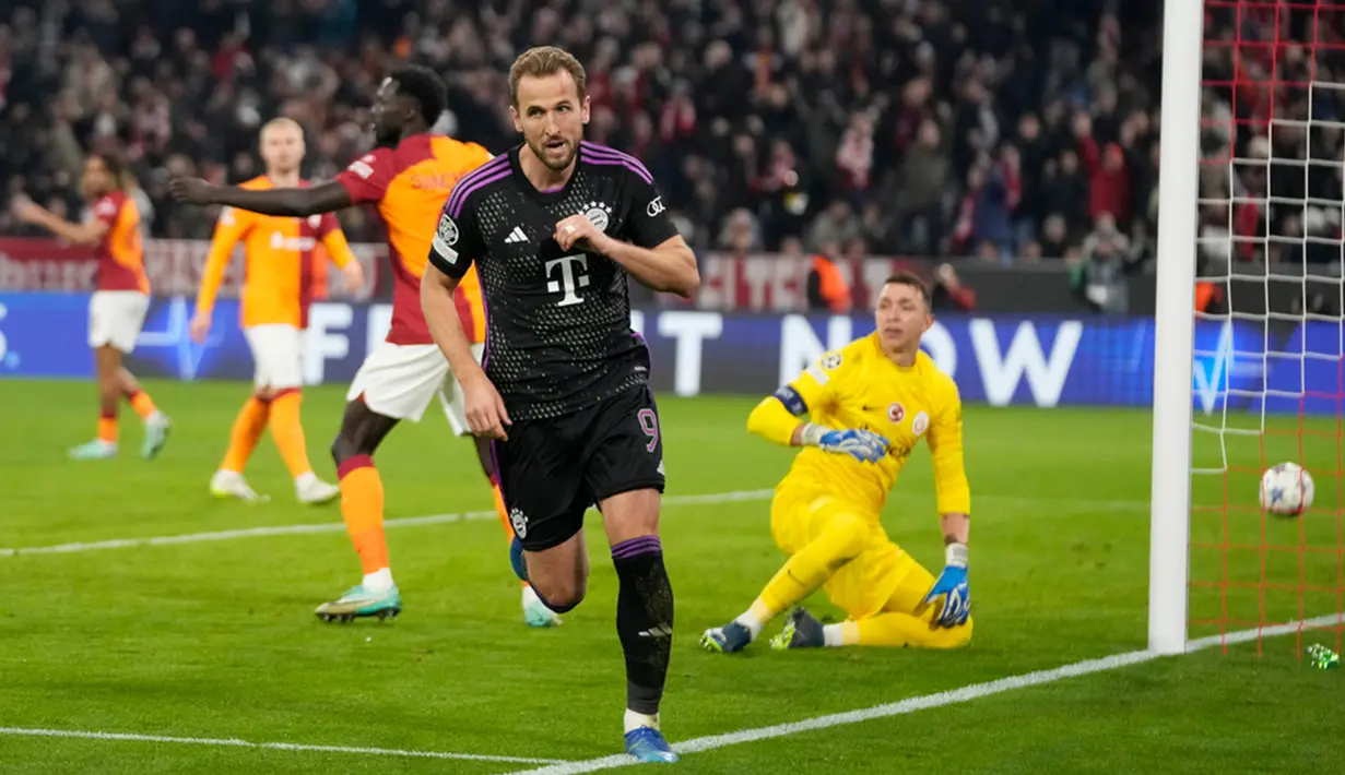 Harry Kane tampil cemerlang dengan mencetak dua gol pada pertandingan ini. (AP Photo/Matthias Schrader)