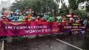 <p>Massa yang tergabung dari berbagai elemen masyarakat melakukan aksi damai dengan membentangkan poster di kawasan Monumen Nasional, Jakarta, Indonesia, Rabu (8/3/2023). Dalam aksi memperingati Hari Wanita Internasional, mereka menyerukan untuk melawan segala bentuk penindasan hak, perlindungan, menolak perkawinan anak serta menjamin kesehatan perempuan. (Liputan6.com/Johan Tallo)</p>