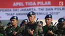 Prajurit TNI mengikuti apel tiga pilar pengamanan pemilu serentak di Lapangan Monas, Jakarta, Rabu (27/2). Pemprov DKI menggelar apel siaga pengamanan Pemilu 2019 pada 17 April  mendatang bersama Polri dan TNI. (Merdeka.com/Imam Buhori)