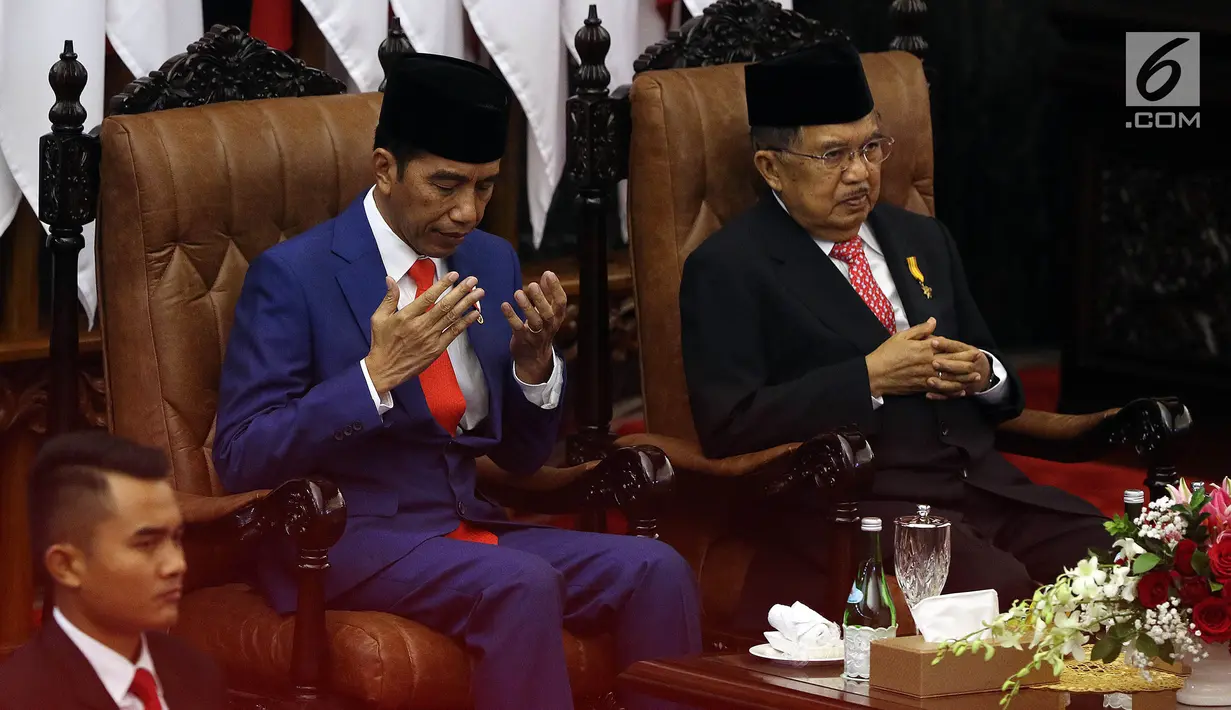 Presiden Joko Widodo (kiri) dan Wakil Presiden Jusuf Kalla saat menghadiri Sidang Paripurna di Gedung DPR, Jakarta, Jumat (16/8/2019). Nantinya DPR akan membahas RAPBN 2020 untuk selanjutnya disahkan menjadi UU. (Liputan6.com/JohanTallo)