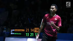 Tunggal putra Indonesia, Tommy Sugiarto merayakan poin saat melawan pebulu tangkis China Taipei, Chou Tien Chen pada 16 besar Indonesia Open 2018 di Istora GBK, Jakarta, Kamis (5/7). Tommy unggul 21-13, 14-21, 21-18. (Liputan6.com/Helmi Fithriansyah)