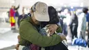 Lebih dari 200 warga negara Nepal yang dievakuasi oleh pemerintah telah kembali ke negara mereka pada hari Jumat (13/10). (AP Photo/Niranjan Shrestha)