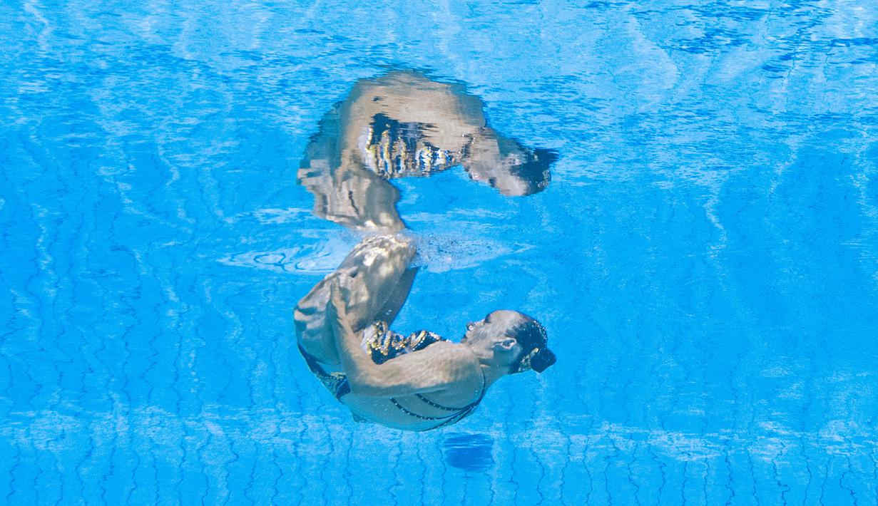 Perenang Swiss, Ilona Fahrni, saat beraksi pada ajang World Aquatics Championships di Budapest, Hungaria, Rabu (22/6/2022). (AFP/Oli Scarff)