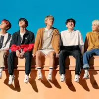 Dalam sebuah kesempatan, RM mengungkapkan jika dirinya senang ketika musik BTS didengar dan dinikmati oleh banyak orang meskipun mereka bernuanyi dengan bahasa yang berbeda. (Foto: Soompi.com)
