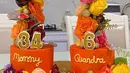 Hiasan bunga yang cantik warna orange dan kuning dengan angka 34 di bawahnya tertulis nama Mommy dan disebelahnya 6 dan bertuliskan Qiandra. [Instagram/avatarryana_dea]