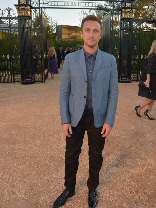 "Diriku merindukan sesosok karakter Draco Malfoy yang begitu membenci Harry Potter, tiap tahun aku selalu mewarnai rambut coklat ku agar berwarna pirang,"ucap Tom. (AFP/Bintang.com)