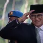 Menteri Pariwisata Sandiaga Uno tiba untuk menghadiri Sidang Tahunan MPR, Sidang Bersama DPR dan DPD tahun 2024 di kompleks Parlemen, Senayan, Jakarta, Jumat (16/8/2024). (Yasuyoshi CHIBA / AFP)