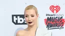 Kedua pasangan ini rupanya risih ketika banyak rumor bahwa mereka tengah mengakhiri hubungannya, namun Iggy dan Nick segera tepis kabar miring yang kini menjadi buah bibir publik. (AFP/Bintang.com)