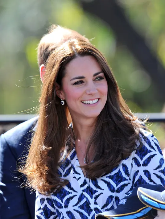 Tak hanya cantik, Kate Middleton juga ramah dan murah senyum. (Bintang/EPA)