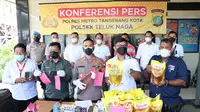 Polisi menangkap 7 pembobol minimarket di Kota Tangerang. (Liputan6.com/Pramita Tristiawati)