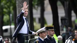 Emmanuel Macron akan menjadi presiden termuda dalam sejarah Perancis, Paris, Minggu (14/5). (AFP PHOTO / CHARLY TRIBALLEAU)