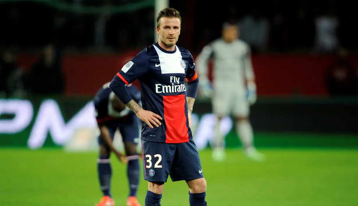 David Beckham yang pernah bermain di Manchester United, Real Madrid, AC Milan, LA Galaxy, dan PSG ini kerap menjadi bintang iklan produk-produk terkenal dunia. (AFP/Fred Dufour)