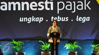 Menteri Keuangan Sri Mulyani memberikan sambutan saat farewell atau perpisahan dengan program pengampunan pajak atau tax amnesty di Jakarta, Selasa (28/2). Penerimaan tax amnesty hingga hari ini telah mencapai Rp 112 triliun.(Liputan6.com/Angga Yuniar) 