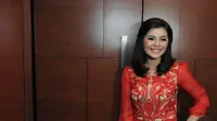 Motivator Merry Riana saat menghadiri gala premier film yang menceritakan tentang dirinya di Plaza Senayan, Jakarta, Senin (22/12/2014). (Liputan6.com/Herman Zakharia)