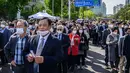 <p>Para tamu tiba menjelang pelantikan presiden baru Korea Selatan, Yoon Suk-yeol di Majelis Nasional di Seoul, Selasa (10/5/2022). Yoon Suk-yeol akan dilantik sebagai Presiden Korea Selatan untuk periode kepresidenan ke-20 pada hari Selasa ini. (ANTHONY WALLACE / AFP)</p>