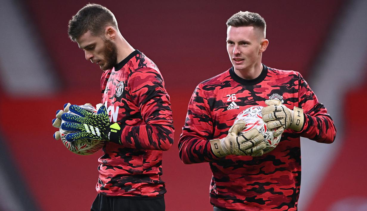David De Gea. Kiper berusia 30 tahun ini telah 10 musim bersama Manchester United. Ia harus bersaing keras dengan Dean Henderson untuk menjadi kiper utama. Akibat sering membuat blunder, musim lalu ia mulai tersingkir dan hanya tampil dalam 36 laga di semua ajang. (Foto: AFP/Pool/Laurence Griffiths)